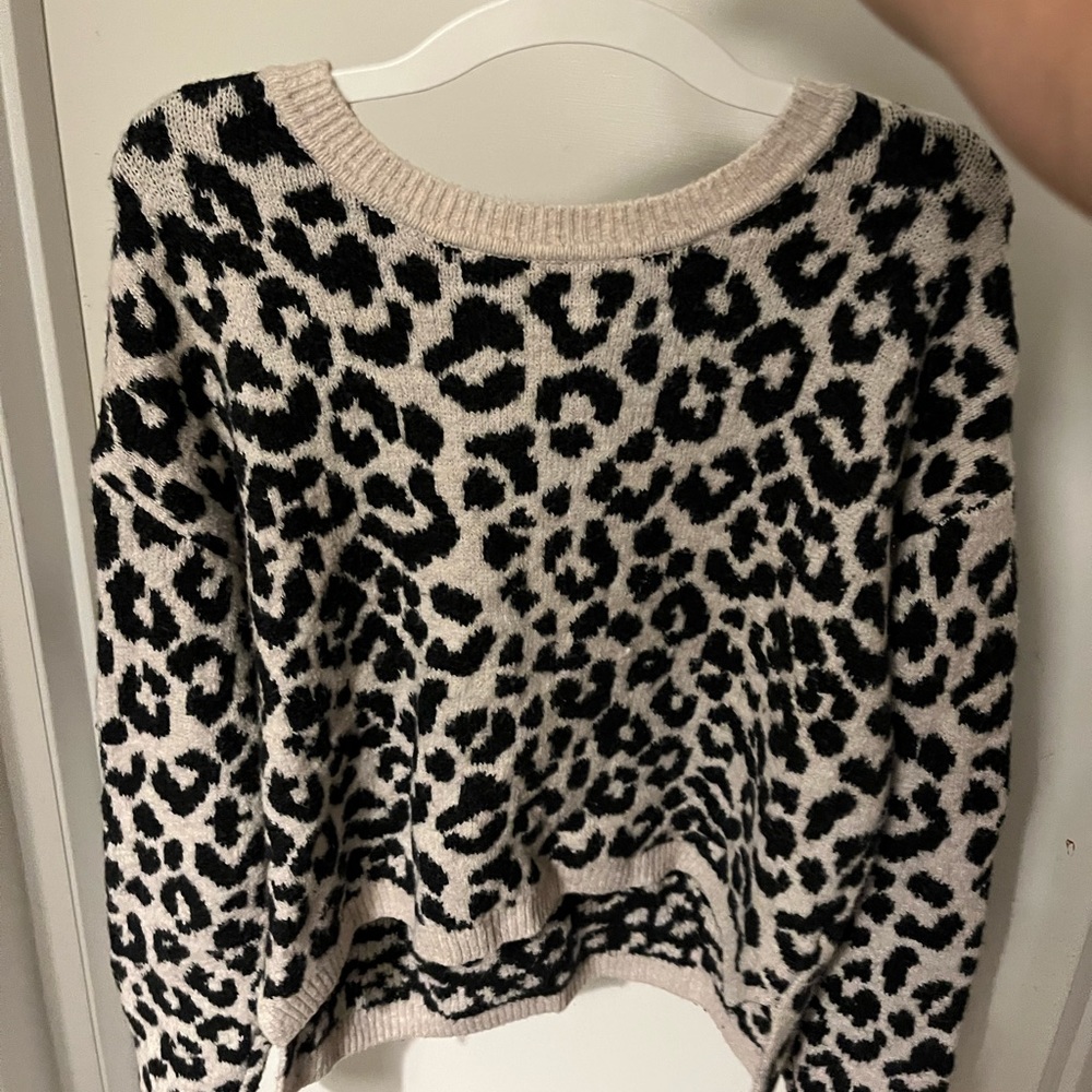 cute white and black womans cheetah sweater